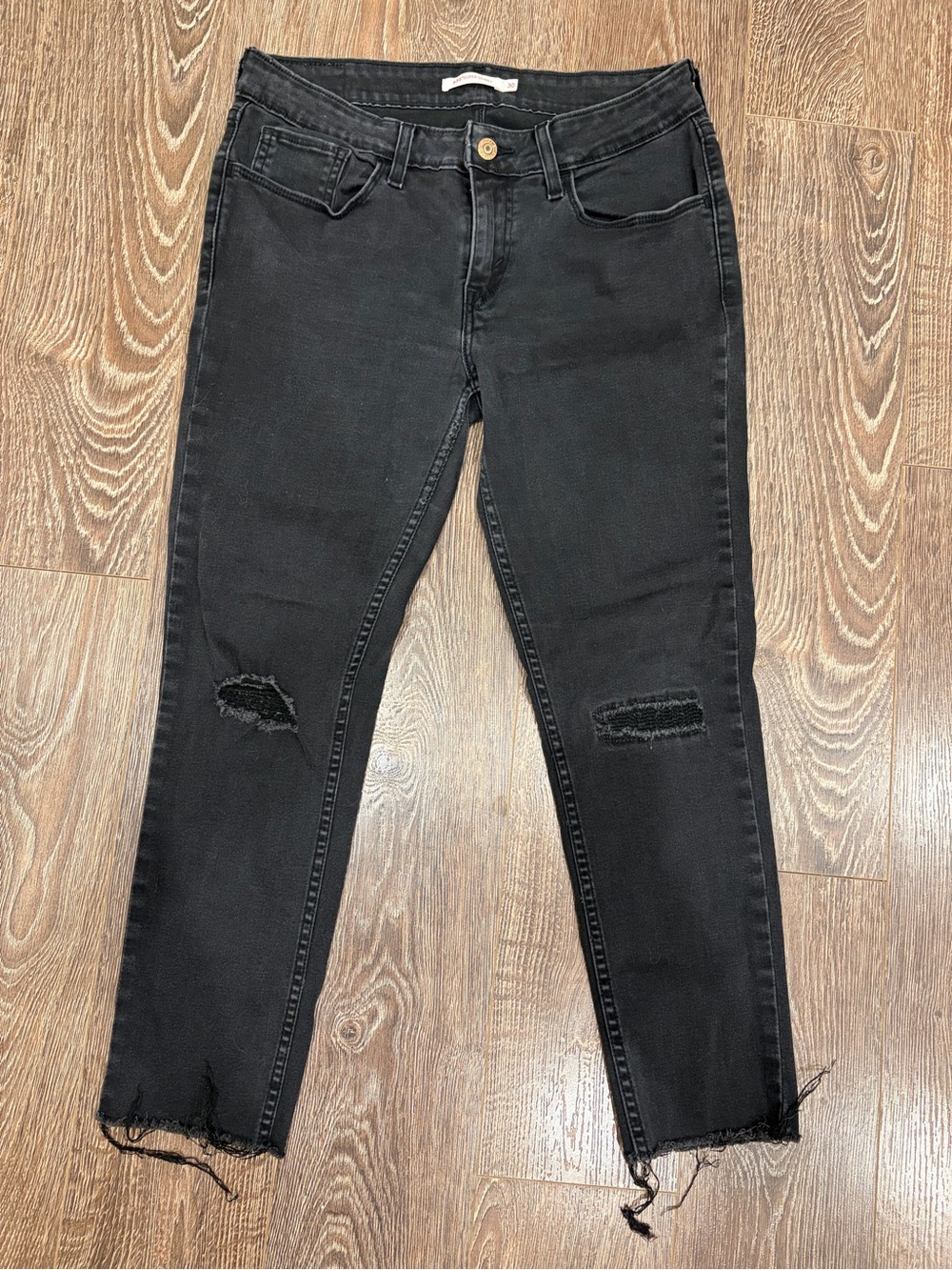 Levi's Black Skinny Jeans with Distressed Knees